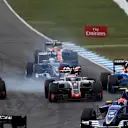 Esteban Gutierrez (MEX) Haas VF-16, Romain Grosjean (FRA) Haas VF-16 and Pascal Wehrlein (GER) Manor Racing MRT05 battle at Formula One World Championship, Rd12, German Grand Prix, Race, Hockenheim, Germany, Sunday 31 July 2016. © Sutton Images