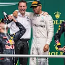 Lewis Hamilton (GBR) Mercedes AMG F1 and Max Verstappen (NED) Red Bull Racing celebrate on the podium with the champagne as Daniel Ricciardo (AUS) Red Bull Racing drinks champagne from his race boot at Formula One World Championship, Rd12, German Grand Prix, Race, Hockenheim, Germany, Sunday 31 July 2016. © Sutton Images