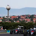 Jenson Button (GBR) McLaren MP4-31 and Fernando Alonso (ESP) McLaren MP4-31 at Formula One World Championship, Rd11, Practice, Hungaroring, Hungary, Friday 22 July 2016. © Sutton Images