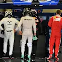 Valtteri Bottas (FIN) Williams, Nico Rosberg (GER) Mercedes AMG F1 and Sebastian Vettel (GER) Ferrari in parc ferme at Formula One World Championship, Rd11, Hungarian Grand Prix, Qualifying, Hungaroring, Hungary, Saturday 23 July 2016. © Sutton Images