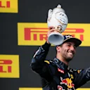Daniel Ricciardo (AUS) Red Bull Racing celebrates on the podium with the trophy at Formula One World Championship, Rd11, Hungarian Grand Prix, Race, Hungaroring, Hungary, Sunday 24 July 2016. © Sutton Images