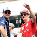 Marcus Ericsson (SWE) Sauber and Kimi Raikkonen (FIN) Ferrari on the drivers parade at Formula One World Championship, Rd11, Hungarian Grand Prix, Race, Hungaroring, Hungary, Sunday 24 July 2016. © Sutton Images