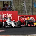 Valtteri Bottas (FIN) Williams FW38 and Daniel Ricciardo (AUS) Red Bull Racing RB12 battle at Formula One World Championship, Rd11, Hungarian Grand Prix, Race, Hungaroring, Hungary, Sunday 24 July 2016. © Sutton Images