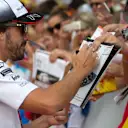 Fernando Alonso (ESP) McLaren signs autographs for the fans at Formula One World Championship, Rd11, Hungarian Grand Prix, Race, Hungaroring, Hungary, Sunday 24 July 2016. © Sutton Images