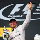 Nico Rosberg (GER) Mercedes AMG F1 celebrates on the podium with the trophy at Formula One World Championship, Rd11, Hungarian Grand Prix, Race, Hungaroring, Hungary, Sunday 24 July 2016. © Sutton Images