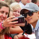 Rio Haryanto (IDN) Manor Racing fans selfie at Formula One World Championship, Rd11, Hungarian Grand Prix, Race, Hungaroring, Hungary, Sunday 24 July 2016. © Sutton Images