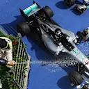 Race winner Lewis Hamilton (GBR) Mercedes AMG F1 celebrates on the podium with the champagne at Formula One World Championship, Rd11, Hungarian Grand Prix, Race, Hungaroring, Hungary, Sunday 24 July 2016. © Sutton Images