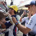 Jenson Button (GBR) McLaren signs autographs for the fans at Formula One World Championship, Rd11, Preparations, Hungaroring, Hungary, Thursday 21 July 2016. © Sutton Images