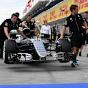 Mercedes AMG F1 mechanics with Mercedes-Benz F1 W07 Hybrid in pit lane at Formula One World Championship, Rd11, Preparations, Hungaroring, Hungary, Thursday 21 July 2016. © Sutton Images