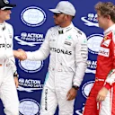 Nico Rosberg (GER) Mercedes AMG F1, Lewis Hamilton (GBR) Mercedes AMG F1 and Sebastian Vettel (GER) Ferrari in parc ferme at Formula One World Championship, Rd14, Italian Grand Prix, Qualifying, Monza, Italy, Saturday 3 September 2016. © Sutton Images