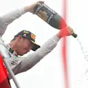 Race winner Nico Rosberg (GER) Mercedes AMG F1 celebrates on the podium with the champagne at Formula One World Championship, Rd14, Italian Grand Prix, Race, Monza, Italy, Sunday 4 September 2016. © Sutton Images