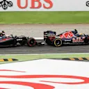 Jenson Button (GBR) McLaren MP4-31 and Carlos Sainz (ESP) Scuderia Toro Rosso STR11 battle at Formula One World Championship, Rd14, Italian Grand Prix, Race, Monza, Italy, Sunday 4 September 2016. © Sutton Images