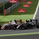 Esteban Gutierrez (MEX) Haas VF-16 and Jenson Button (GBR) McLaren MP4-31 battle at Formula One World Championship, Rd14, Italian Grand Prix, Race, Monza, Italy, Sunday 4 September 2016. © Sutton Images