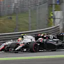 Esteban Gutierrez (MEX) Haas VF-16 and Jenson Button (GBR) McLaren MP4-31 battle at Formula One World Championship, Rd14, Italian Grand Prix, Race, Monza, Italy, Sunday 4 September 2016. © Sutton Images