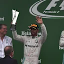 Lewis Hamilton (GBR) Mercedes AMG F1 celebrates on the podium with the trophy at Formula One World Championship, Rd14, Italian Grand Prix, Race, Monza, Italy, Sunday 4 September 2016. © Sutton Images