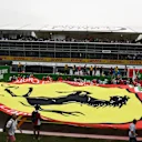 Fans and giant Ferrari flag on track at Formula One World Championship, Rd14, Italian Grand Prix, Race, Monza, Italy, Sunday 4 September 2016. © Sutton Images