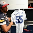 Carlos Sainz (ESP) Scuderia Toro Rosso with Real Madrid football shirt at Formula One World Championship, Rd14, Italian Grand Prix, Preparations, Monza, Italy, Thursday 1 September 2016. © Sutton Images