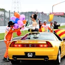 Girl and marshals at Formula One World Championship, Rd17, Japanese Grand Prix, Qualifying, Suzuka, Japan, Saturday 8 October 2016. © Sutton Images
