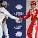 Lewis Hamilton (GBR) Mercedes AMG F1 and Kimi Raikkonen (FIN) Ferrari celebrate in parc ferme at Formula One World Championship, Rd17, Japanese Grand Prix, Qualifying, Suzuka, Japan, Saturday 8 October 2016. © Sutton Images