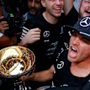 Nico Rosberg (GER) Mercedes AMG F1 celebrates the constructors championship with the team and the trophy at Formula One World Championship, Rd17, Japanese Grand Prix, Race, Suzuka, Japan, Sunday 9 October 2016. © Sutton Images