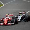 Kimi Raikkonen (FIN) Ferrari SF16-H and Sergio Perez (MEX) Force India VJM09 at Formula One World Championship, Rd17, Japanese Grand Prix, Race, Suzuka, Japan, Sunday 9 October 2016. © Sutton Images