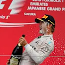 Race winner Nico Rosberg (GER) Mercedes AMG F1 celebrates on the podium with the champagne at Formula One World Championship, Rd17, Japanese Grand Prix, Race, Suzuka, Japan, Sunday 9 October 2016. © Sutton Images