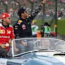 Sebastian Vettel (GER) Ferrari and Daniel Ricciardo (AUS) Red Bull Racing on the drivers parade at Formula One World Championship, Rd17, Japanese Grand Prix, Race, Suzuka, Japan, Sunday 9 October 2016. © Sutton Images