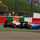 Esteban Gutierrez (MEX) Haas VF-16 and Pascal Wehrlein (GER) Manor Racing MRT05 battle at Formula One World Championship, Rd17, Japanese Grand Prix, Race, Suzuka, Japan, Sunday 9 October 2016. © Sutton Images