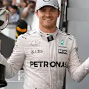 Race winner Nico Rosberg (GER) Mercedes AMG F1 celebrates on the podium with the trophy at Formula One World Championship, Rd17, Japanese Grand Prix, Race, Suzuka, Japan, Sunday 9 October 2016. © Sutton Images