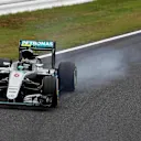 Nico Rosberg (GER) Mercedes-Benz F1 W07 Hybrid locks up at Formula One World Championship, Rd17, Japanese Grand Prix, Race, Suzuka, Japan, Sunday 9 October 2016. © Sutton Images