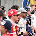 Drivers observe the National Anthem on the grid at Formula One World Championship, Rd17, Japanese Grand Prix, Race, Suzuka, Japan, Sunday 9 October 2016. © Sutton Images