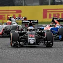 Fernando Alonso (ESP) McLaren MP4-31, Pascal Wehrlein (GER) Manor Racing MRT05 and Esteban Gutierrez (MEX) Haas VF-16 at Formula One World Championship, Rd17, Japanese Grand Prix, Race, Suzuka, Japan, Sunday 9 October 2016. © Sutton Images