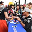 Lewis Hamilton (GBR) Mercedes AMG F1 signs autographs for the fans at Formula One World Championship, Rd17, Japanese Grand Prix, Preparations, Suzuka, Japan, Thursday 6 October 2016. © Sutton Images