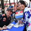 Max Verstappen (NED) Red Bull Racing and fan at Formula One World Championship, Rd17, Japanese Grand Prix, Preparations, Suzuka, Japan, Thursday 6 October 2016. © Sutton Images