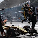 Kevin Magnussen (DEN) Renault Sport F1 Team RS16 leaps from his on fire car in FP1 at Formula One World Championship, Rd16, Malaysian Grand Prix, Practice, Sepang, Malaysia, Friday 30 September 2016. © Sutton Images