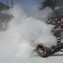 The burning car of Kevin Magnussen (DEN) Renault Sport F1 Team RS16 in pit lane during FP1 at Formula One World Championship, Rd16, Malaysian Grand Prix, Practice, Sepang, Malaysia, Friday 30 September 2016. © Sutton Images