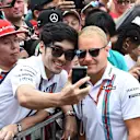 Valtteri Bottas (FIN) Williams poses for a fan selfie photograph at Formula One World Championship, Rd16, Malaysian Grand Prix, Qualifying, Sepang, Malaysia, Saturday 1 October 2016. © Sutton Images