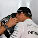 Nico Rosberg (GER) Mercedes AMG F1 with his trainer Daniel Schloesser (GER) at Formula One World Championship, Rd16, Malaysian Grand Prix, Qualifying, Sepang, Malaysia, Saturday 1 October 2016. © Sutton Images