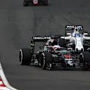 Fernando Alonso (ESP) McLaren MP4-31 and Felipe Massa (BRA) Williams FW38 at Formula One World Championship, Rd16, Malaysian Grand Prix, Qualifying, Sepang, Malaysia, Saturday 1 October 2016. © Sutton Images