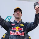Race winner Daniel Ricciardo (AUS) Red Bull Racing celebrates  and drinks champagne from his race boot on the podium at Formula One World Championship, Rd16, Malaysian Grand Prix, Race,  Sepang, Malaysia, Sunday 2 October 2016. © Sutton Images