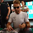 Jenson Button (GBR) McLaren signs autographs for the fans at Formula One World Championship, Rd16, Malaysian Grand Prix, Race, Sepang, Malaysia, Sunday 2 October 2016. © Sutton Images