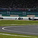 Lewis Hamilton (GBR) Mercedes-Benz F1 W07 Hybrid leads at the start of the race as Nico Rosberg (GER) Mercedes-Benz F1 W07 Hybrid and Sebastian Vettel (GER) Ferrari SF16-H collide at Formula One World Championship, Rd16, Malaysian Grand Prix, Race,  Sepang, Malaysia, Sunday 2 October 2016. © Sutton Images