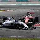 Felipe Massa (BRA) Williams FW38 and Sebastian Vettel (GER) Ferrari SF16-H with damage at the start of the race at Formula One World Championship, Rd16, Malaysian Grand Prix, Race,  Sepang, Malaysia, Sunday 2 October 2016. © Sutton Images