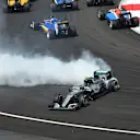 Nico Rosberg (GER) Mercedes-Benz F1 W07 Hybrid spins after contact at the start of the race at Formula One World Championship, Rd16, Malaysian Grand Prix, Race,  Sepang, Malaysia, Sunday 2 October 2016. © Sutton Images