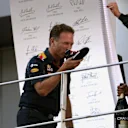 Christian Horner (GBR) Red Bull Racing Team Principal and race winner Daniel Ricciardo (AUS) Red Bull Racing celebrate on the podium and drink champagne from a shoe at Formula One World Championship, Rd16, Malaysian Grand Prix, Race,  Sepang, Malaysia, Sunday 2 October 2016. © Sutton Images