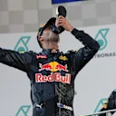 Race winner Daniel Ricciardo (AUS) Red Bull Racing celebrates on the podium and drinks champagne from a shoe at Formula One World Championship, Rd16, Malaysian Grand Prix, Race,  Sepang, Malaysia, Sunday 2 October 2016. © Sutton Images