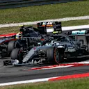 Nico Rosberg (GER) Mercedes-Benz F1 W07 Hybrid and Sergio Perez (MEX) Force India VJM09 battle at Formula One World Championship, Rd16, Malaysian Grand Prix, Race,  Sepang, Malaysia, Sunday 2 October 2016. © Sutton Images