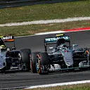 Nico Rosberg (GER) Mercedes-Benz F1 W07 Hybrid and Sergio Perez (MEX) Force India VJM09 battle at Formula One World Championship, Rd16, Malaysian Grand Prix, Race,  Sepang, Malaysia, Sunday 2 October 2016. © Sutton Images