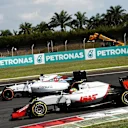 Esteban Gutierrez (MEX) Haas VF-16 and Felipe Massa (BRA) Williams FW38 battle at Formula One World Championship, Rd16, Malaysian Grand Prix, Race,  Sepang, Malaysia, Sunday 2 October 2016. © Sutton Images