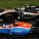 Esteban Ocon (FRA) Manor Racing MRT05 and Sergio Perez (MEX) Force India VJM09 at Formula One World Championship, Rd19, Mexican Grand Prix, Practice, Circuit Hermanos Rodriguez, Mexico City, Mexico, Friday 28 October 2016. © Sutton Images